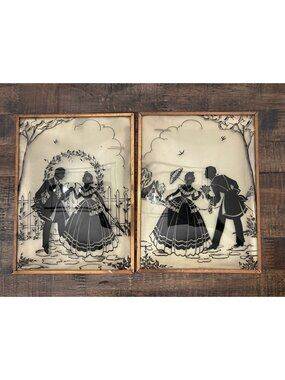 2 reverse painted on convex glass silhouettes man & women in hoop skirt
